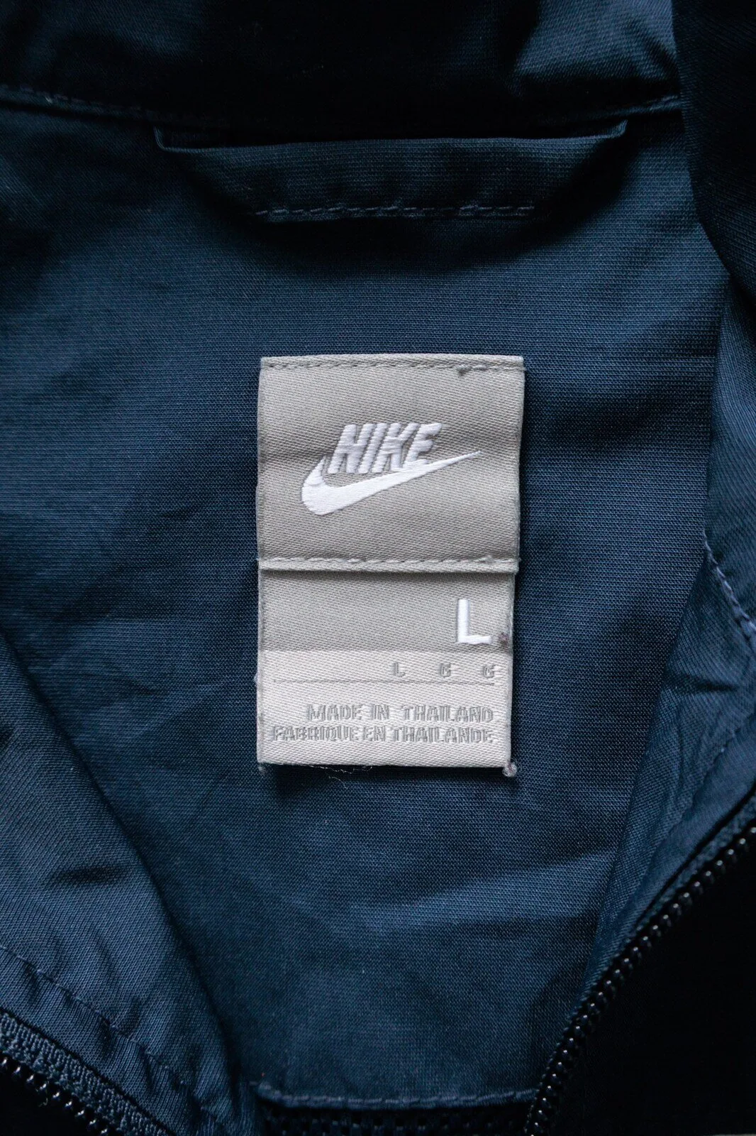 Vintage Nike Navy Blue Windbreaker Jacket with White Stripes 9 Vintage Nike Navy Blue Windbreaker Jacket with White Stripes
